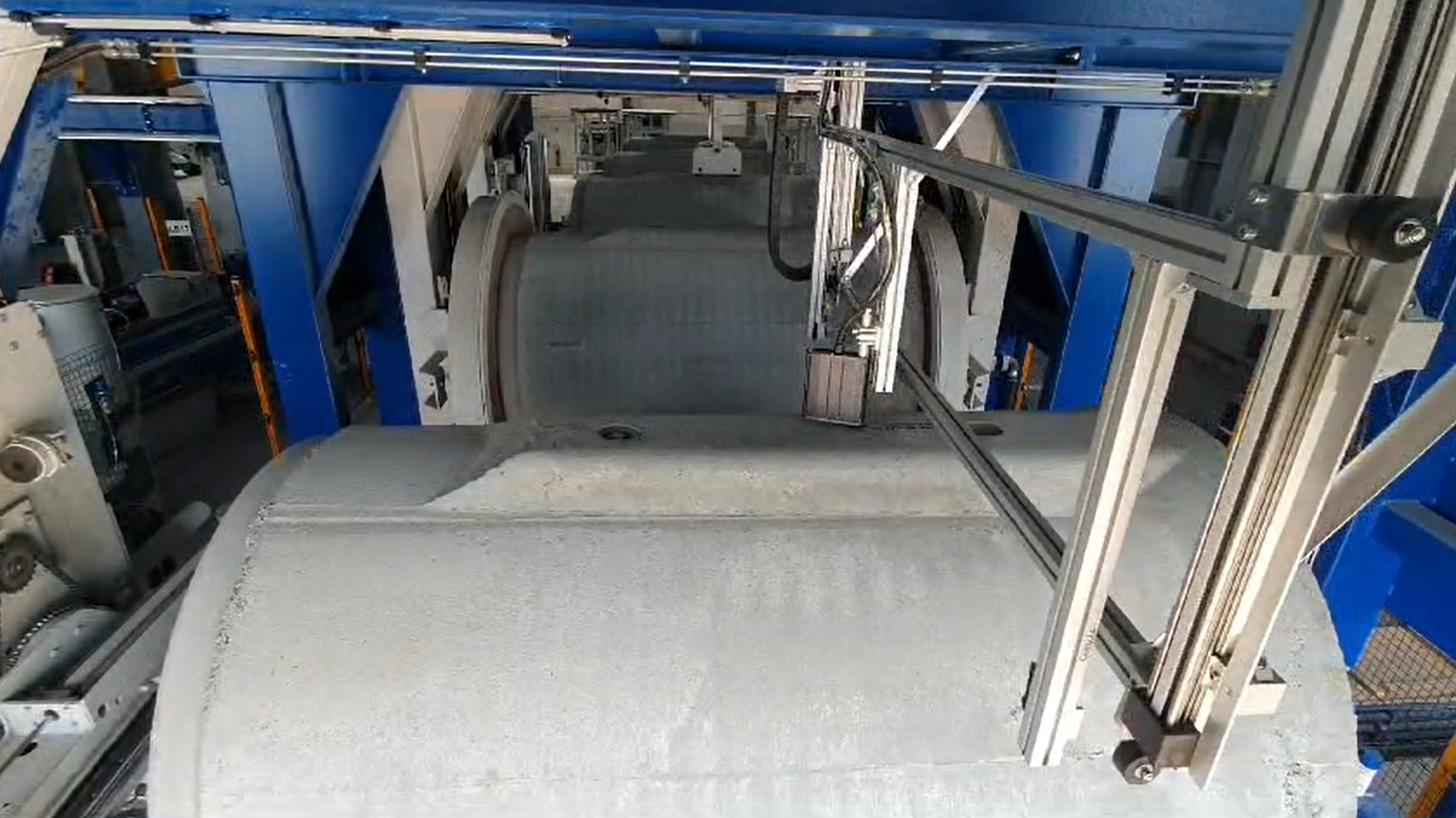 Automated marking system for concrete pipes with igus room gantry