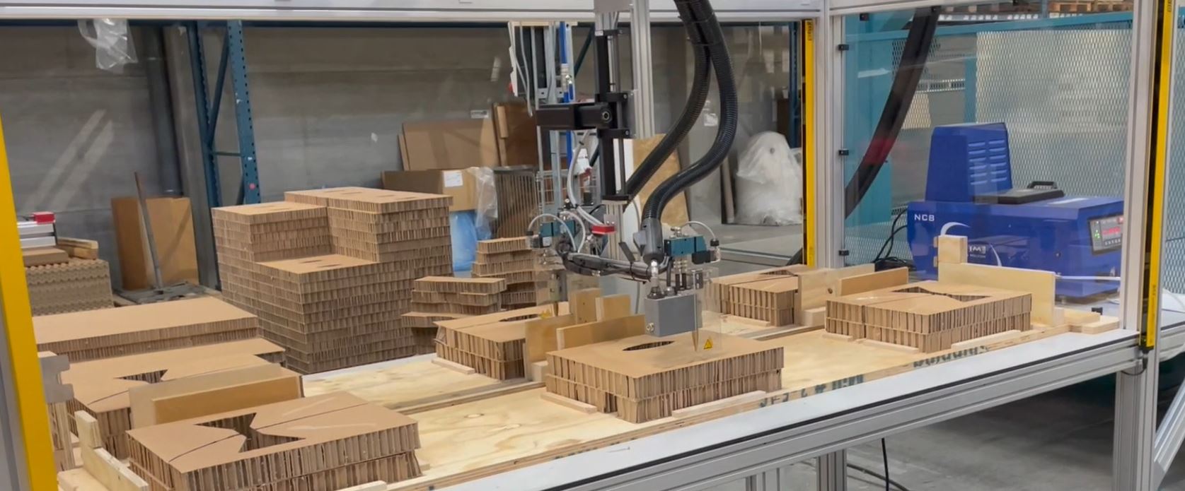 Gantry robot for gluing corrugated crests together